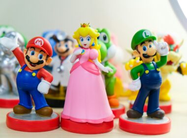 Super Mario, Luigi, and Princess Peach figurines